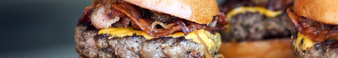 Eating Barbeque Burger at Country Club BBQ restaurant in West Peoria, IL.